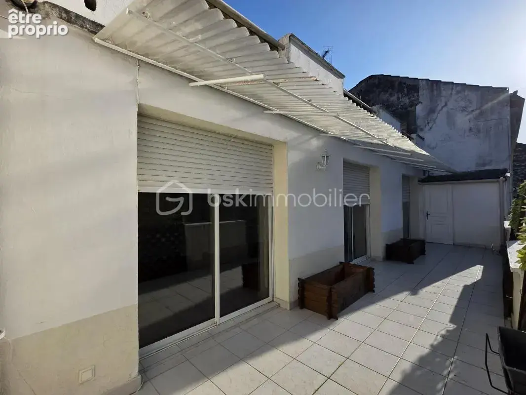 Agen hypercentre-appartement 100 m² - 2 chambres- terrasse- cave - photo 4