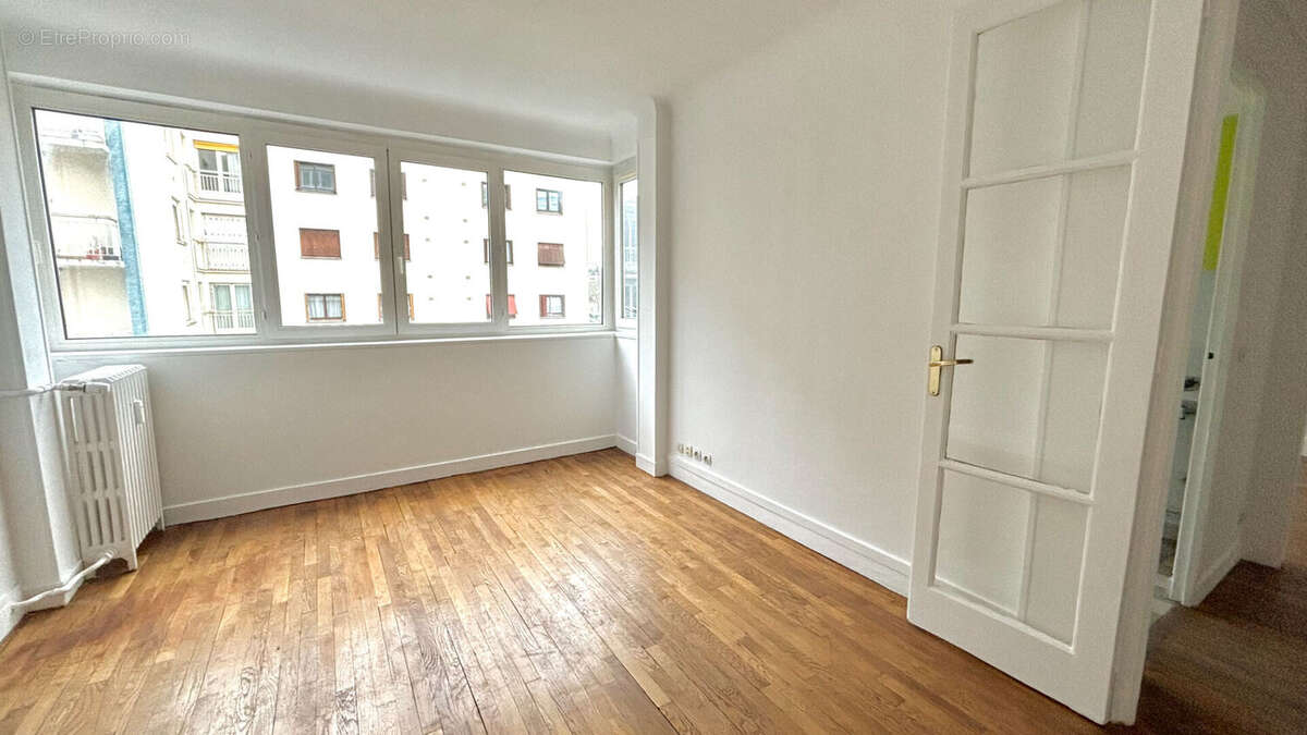 Appartement Paris 3 pièce(s) 57 m2 - photo 2