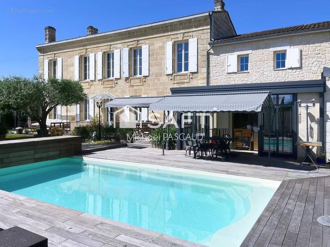 Photo 1 - Maison à SALIGNAC