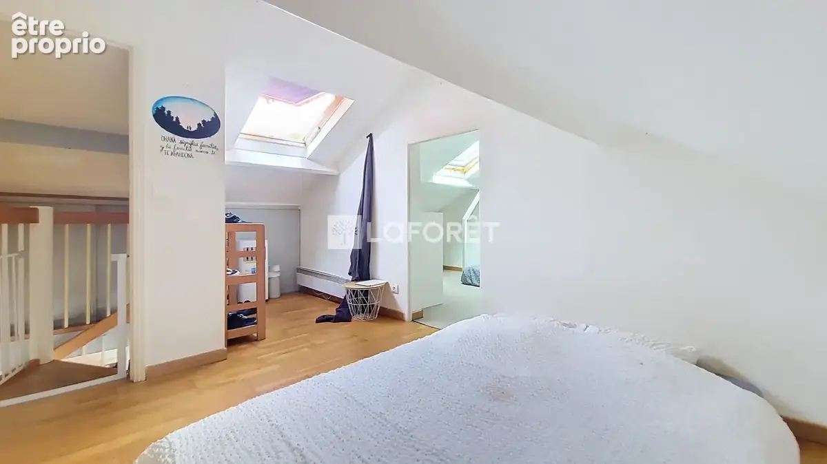 Un duplex aux volumes généreux sous les toits - photo 6