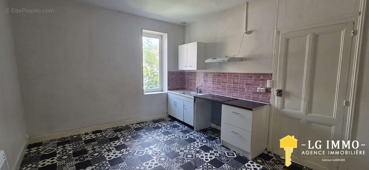 Appartement t3 + local commercial, centre bourg de mortagne - photo 5