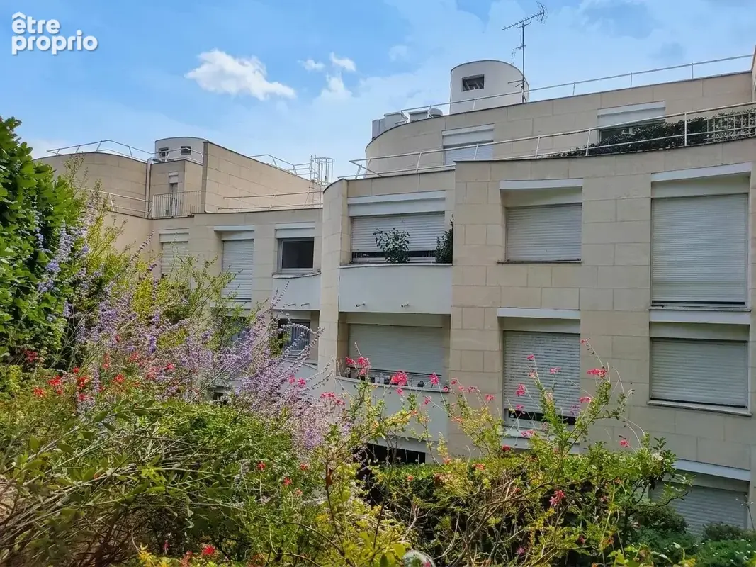 Appartement avec jardin privatif, caves et parking - photo 15
