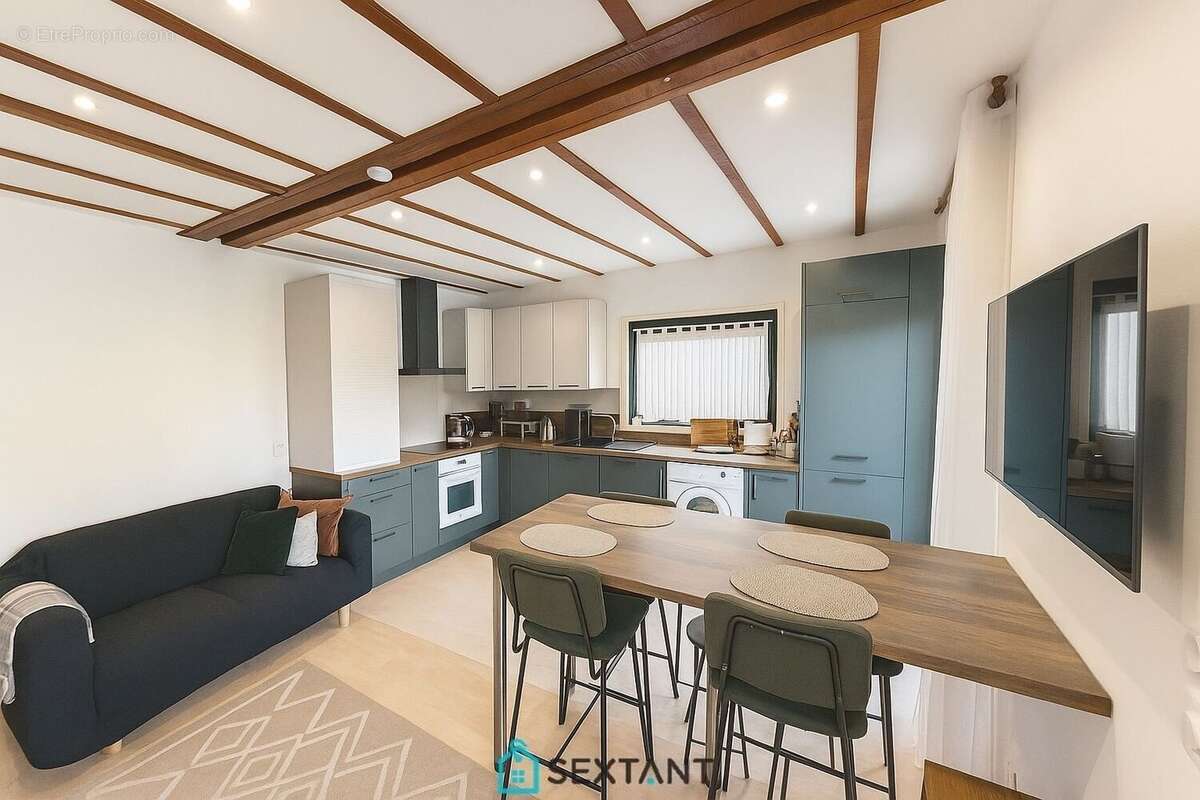 GRILLY- Bel appartement atypique de type T3 56 m² (76 m² utiles) - 415.000  - photo 3