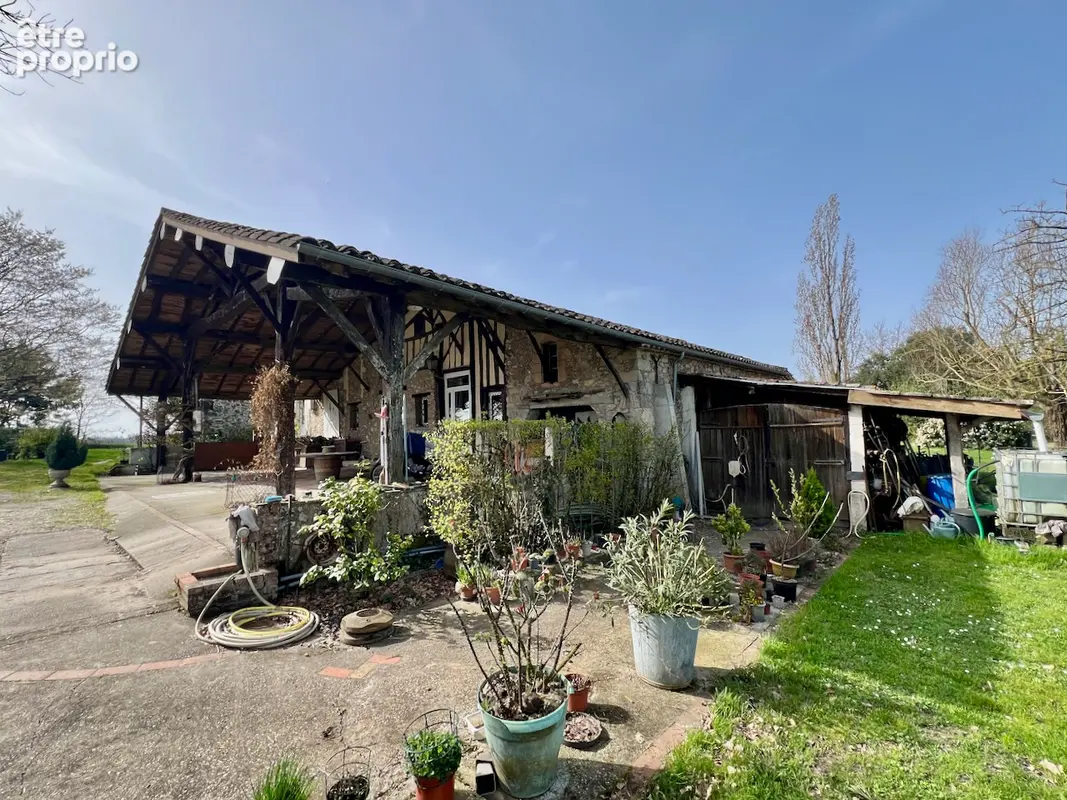 À seulement 15 minutes de Villeneuve-sur-Lot, dans un environnement campagne particulièrement calme et verdoyant, découvrez cett - photo 3