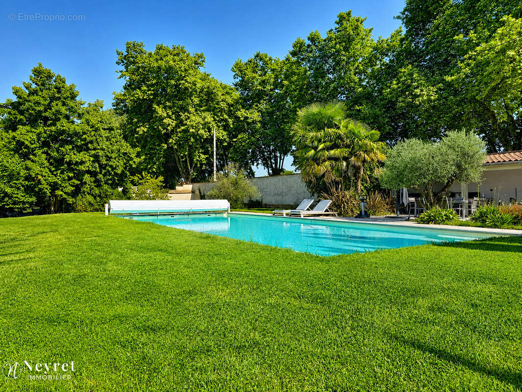 Maison familiale avec piscine, parc paysagé et fort potentiel - photo 5