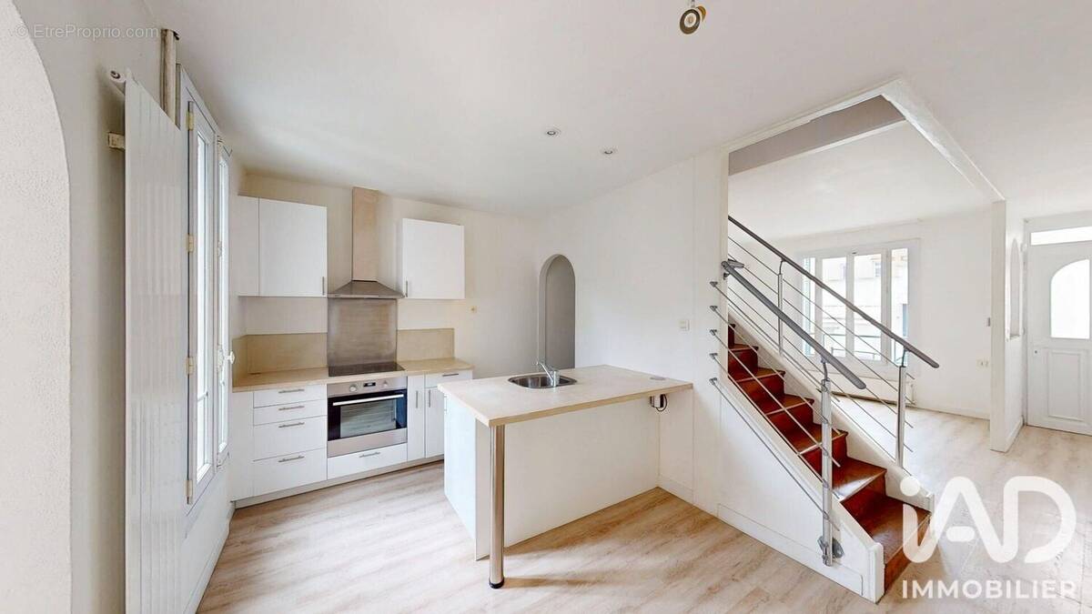Photo 1 - Maison à COURBEVOIE