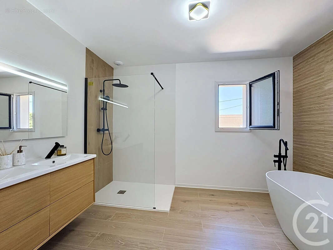 Maison 138 m² à Saint-Denis-En-Val  - photo 9