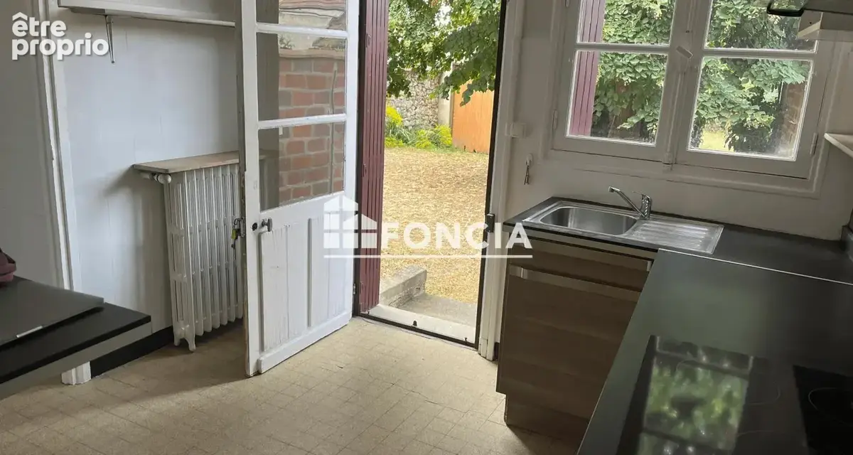 En plein centre ville de bonnieres sur seine au calme maison sur sous-sol avec un grand garage et un jardin clos de murs - photo 5