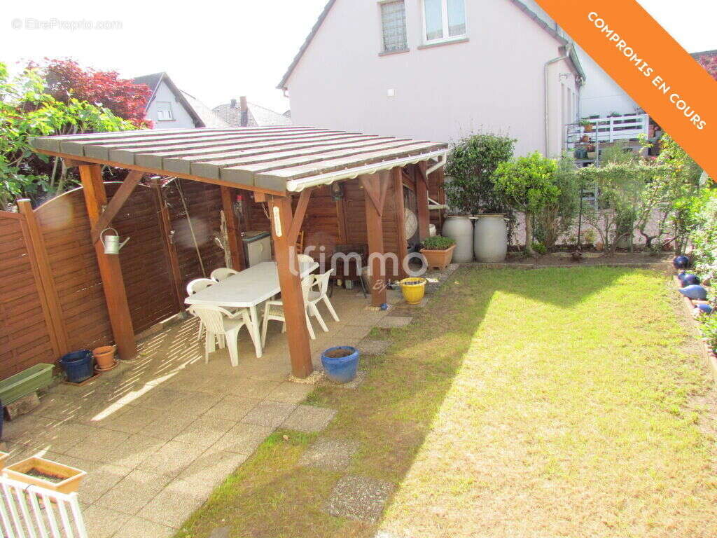 Maison mitoyenne avec un garage et un jardin - photo 2