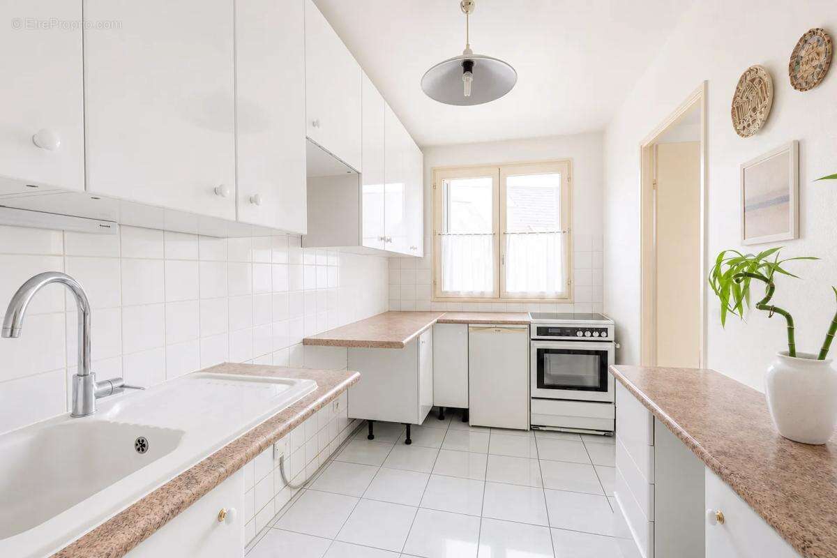 Duplex 4 pièces de 101 m² avec balcon et double garage (box) - photo 4