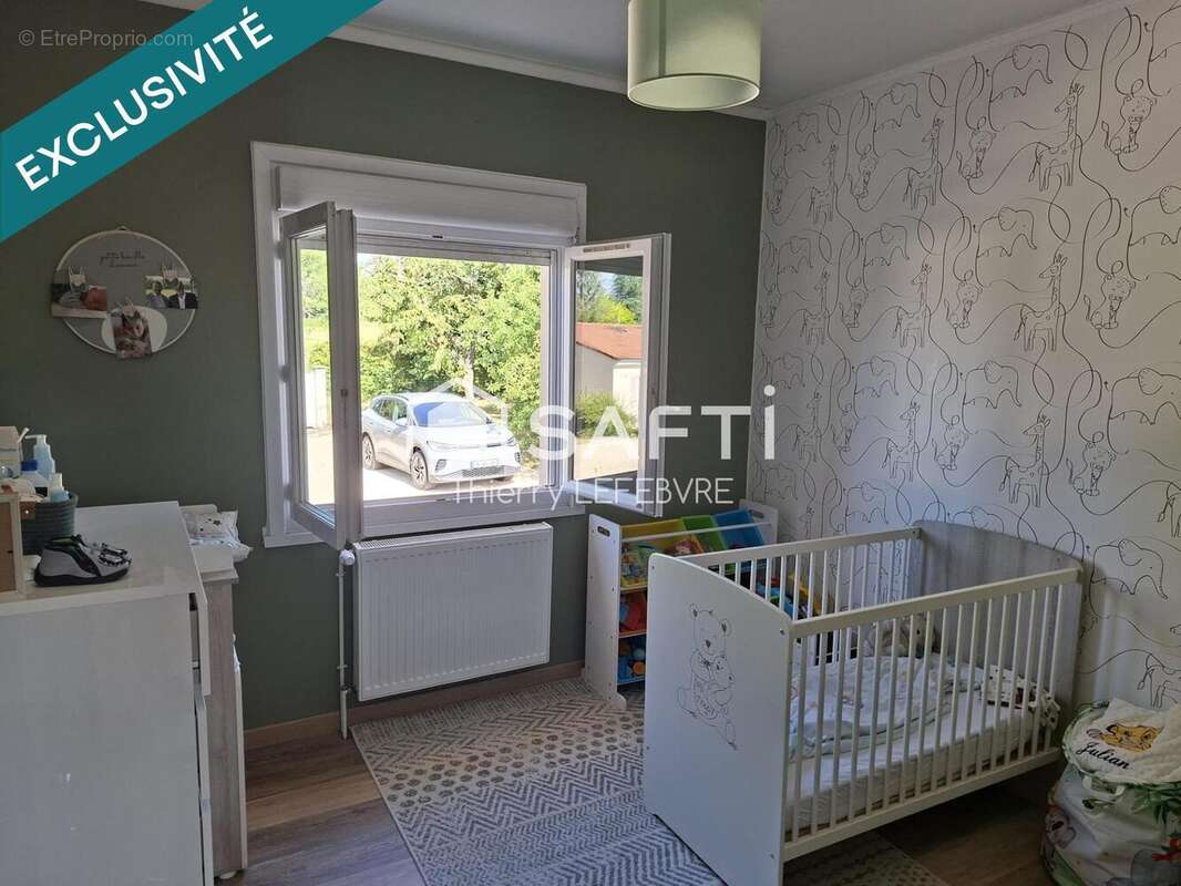 Maison 140 m² à Jaunay-Clan  - photo 6
