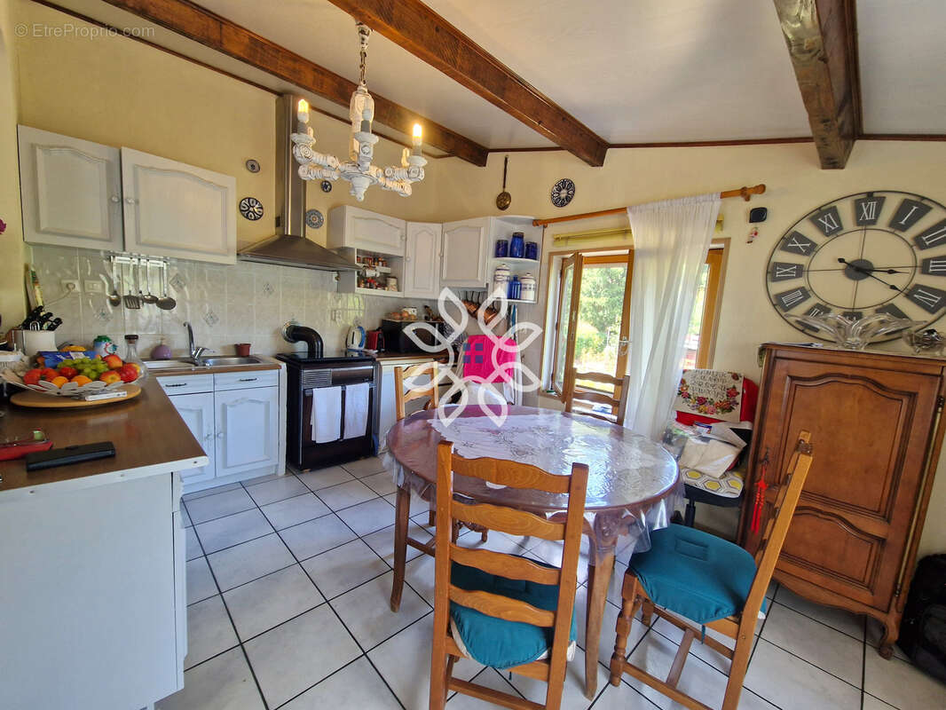 Maison avec terrain clos à Saint-Yvoine - photo 7