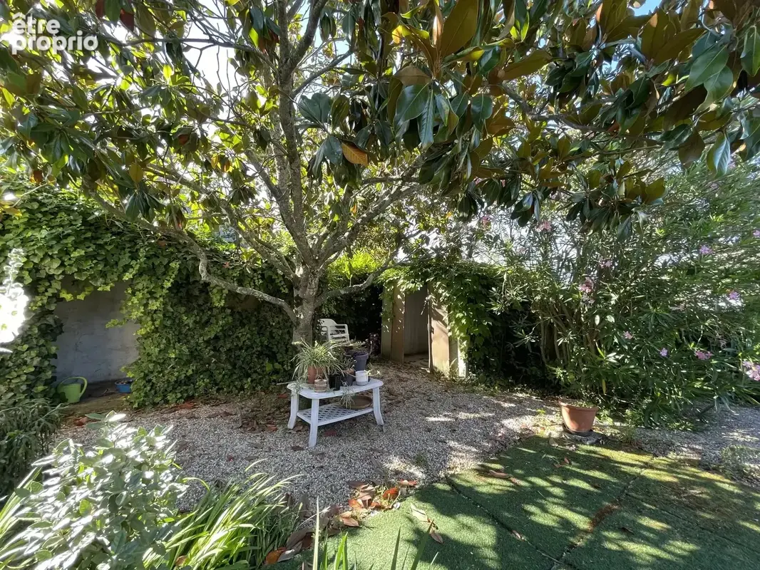 A VENDRE - Maison T4 de plain-pied avec véranda, garage. Terrain de 502 m² - photo 3