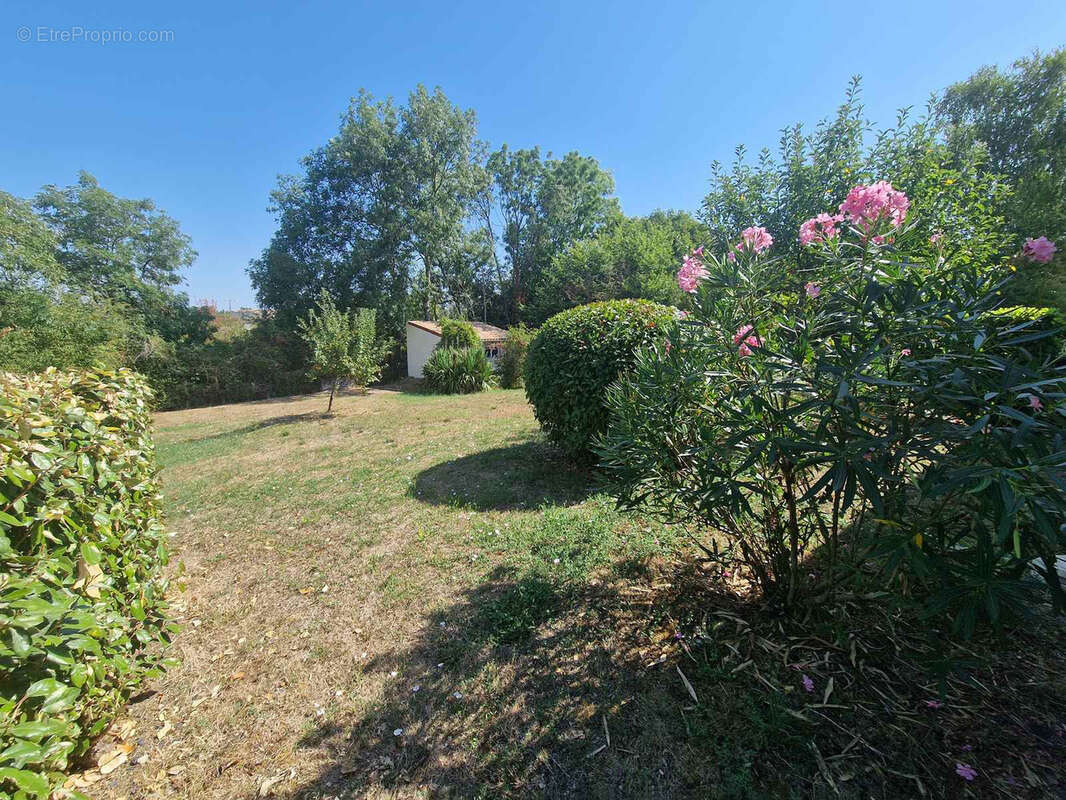 Maison de plain-pied avec jardin et garage - photo 4