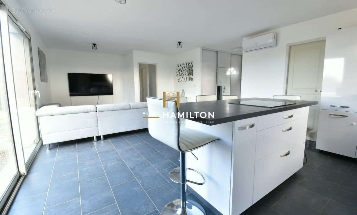 Maison moderne de plain-pied avec suite parentale et grand terrain - photo 12