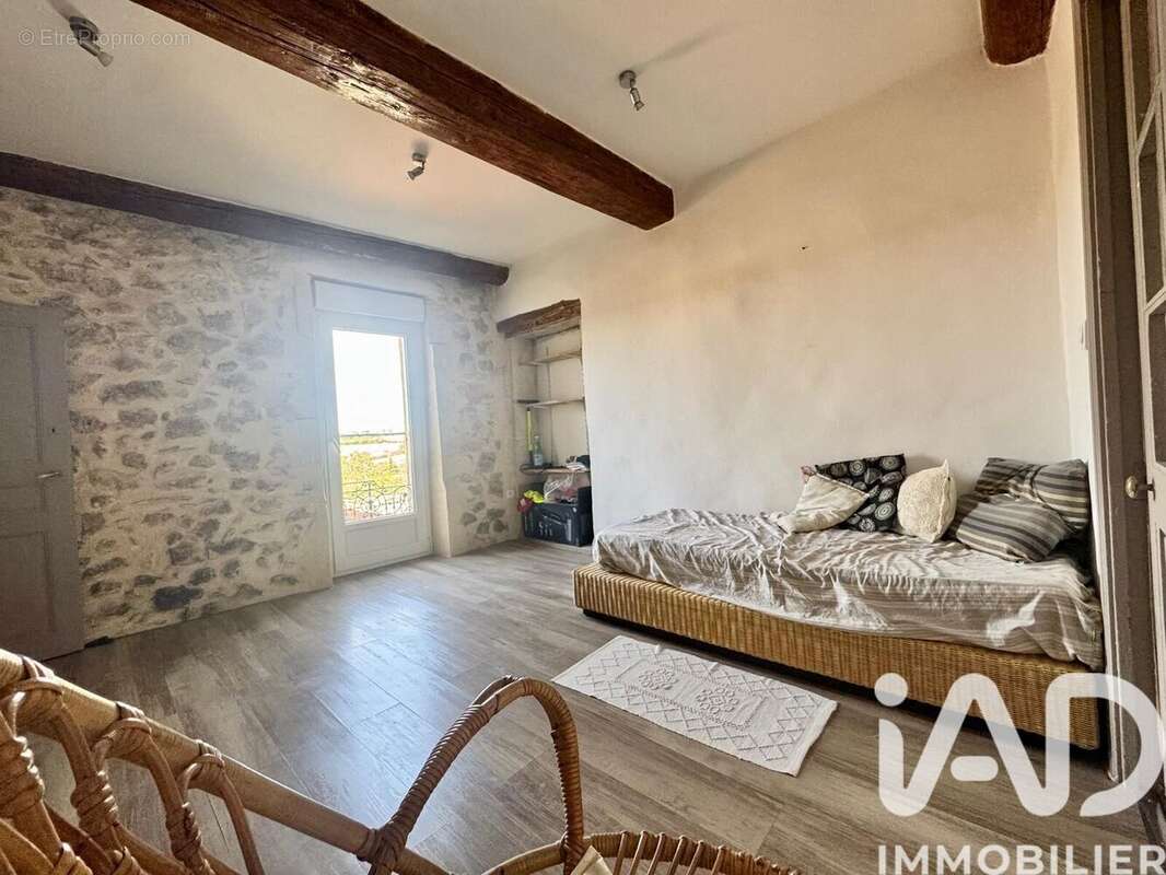 Maison 121 m² à Estezargues  - photo 7