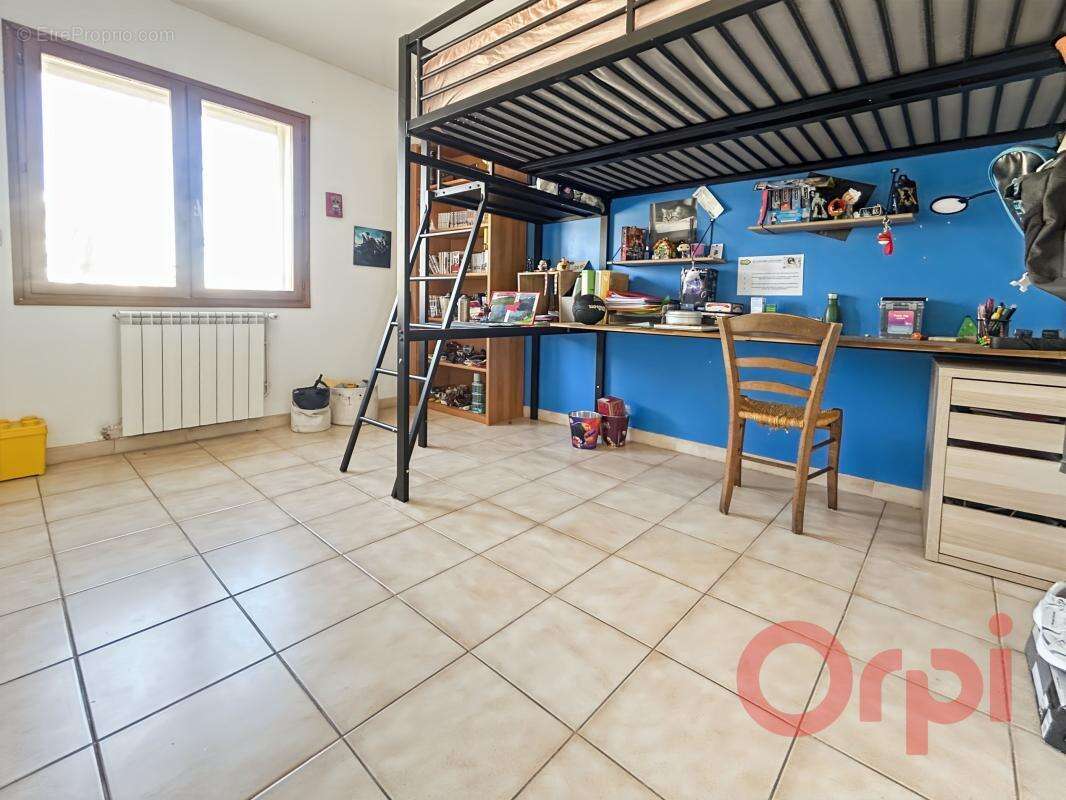 Maison 3 faces avec piscine, terrasse plein sud et sous-sol aménagé - photo 14