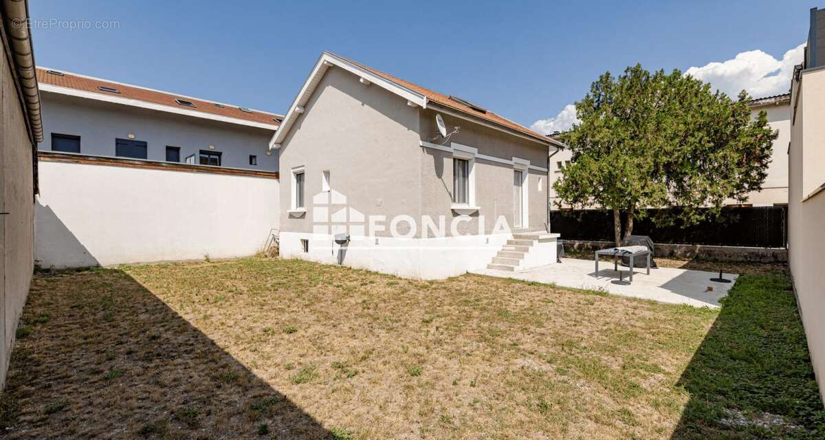 Maison familiale de 109 m² avec jardin – Un cadre de vie privilégié - photo 14