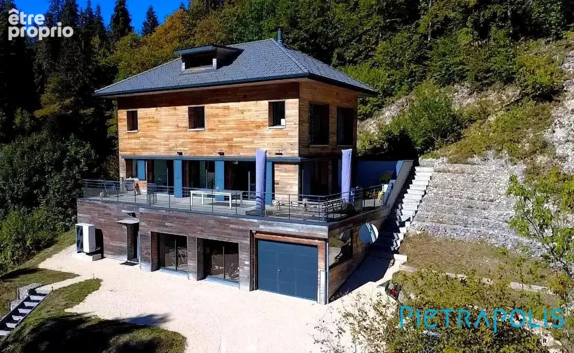 Maison 7 pièces 230 m² à vendre à Mijoux (01170) - photo 3