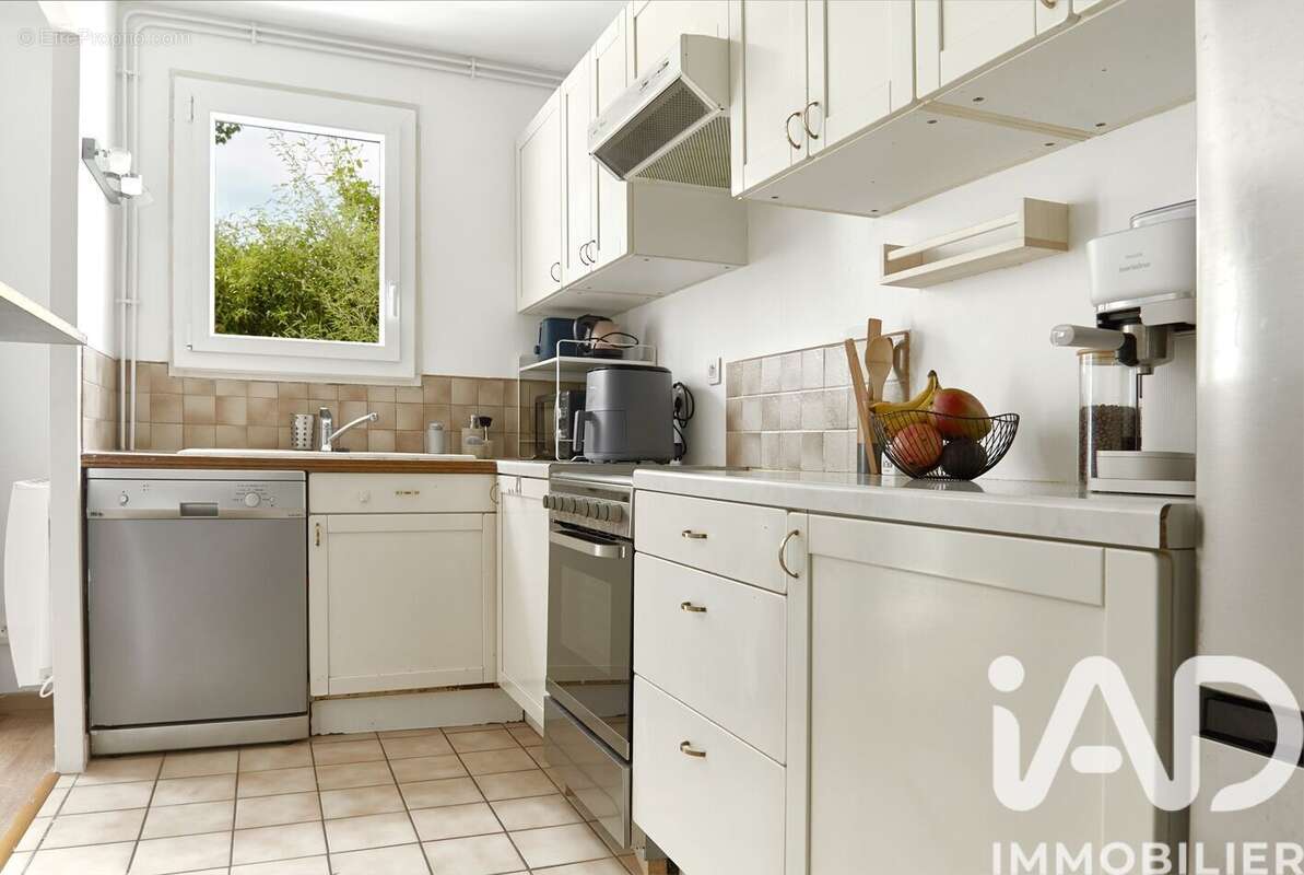 Photo 3 - Appartement à VOISINS-LE-BRETONNEUX