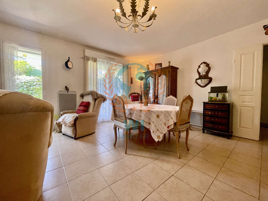 Appartement  en rez-de-jardin avec piscine et garage - photo 11