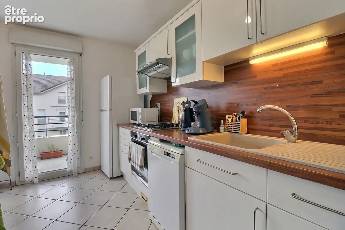 Appartement T3 avec terrasse, cave et garage - photo 4