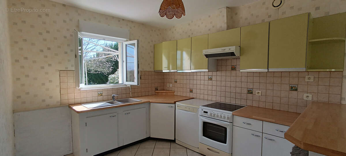 Maison à LUZILLE
