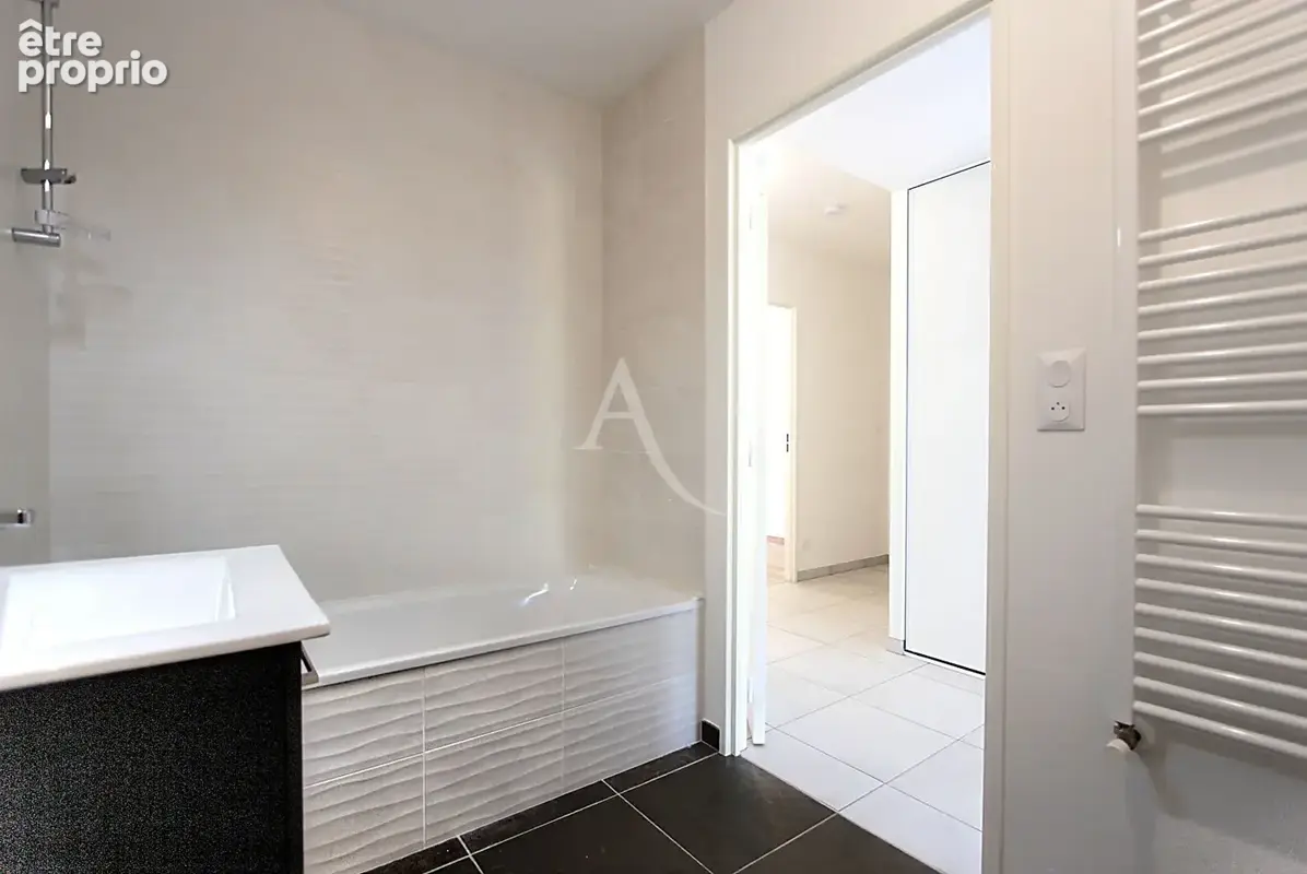 Appartement  3 pièces Rez-de-jardin avec terrasse, parking et accès PMR - photo 9