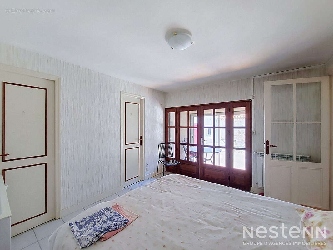 A Vendre Maison en pierre de 118m² avec quatre pièces et terrasse couverte à Condom - photo 9