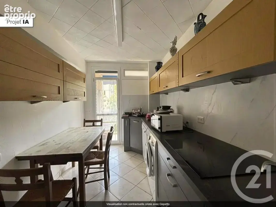 Appartement 61 m² à Saint-Genis-Laval  - photo 3