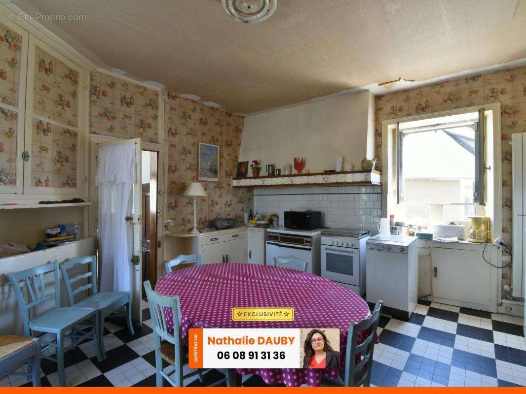 Maison familiale, 5 chambres, au coeur de Prissac (36) - photo 3
