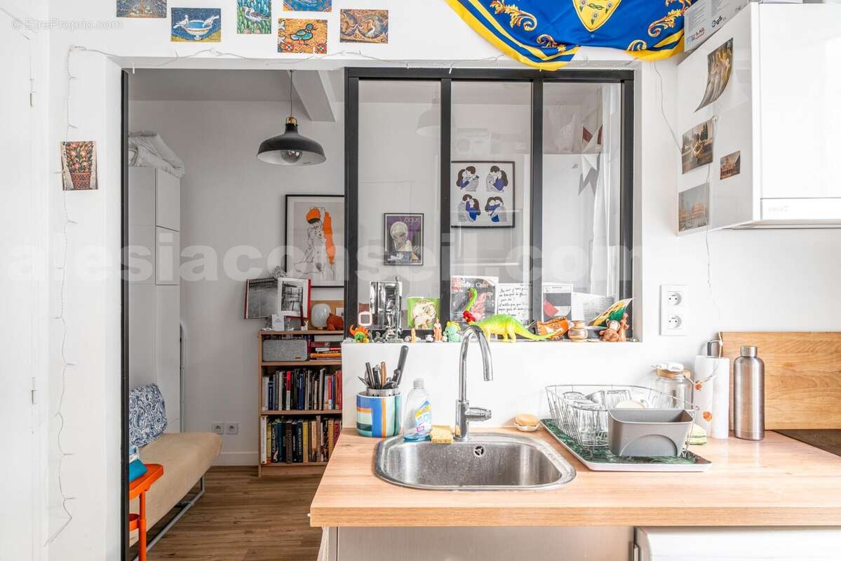 Photo n°3 - Appartement à PARIS-14E