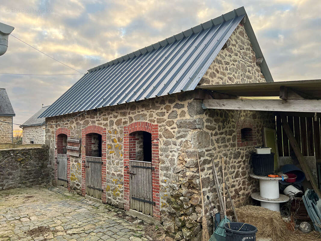 Maison à JUVIGNE