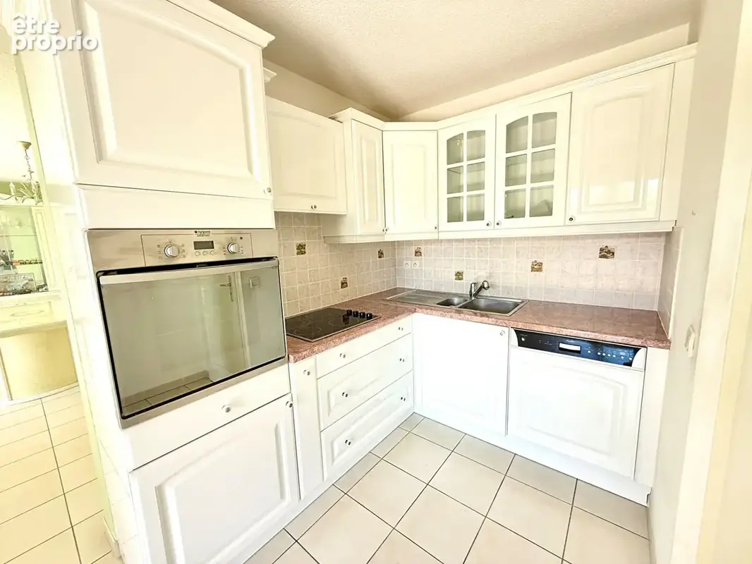 Appartement en rez-de-jardin avec terrasse et place de parking privative63,65 - photo 5