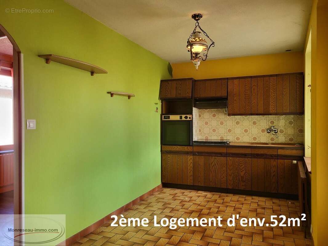 Ensemble Immobilier : 2 logements + dépendances + jardin (constructible) - photo 10