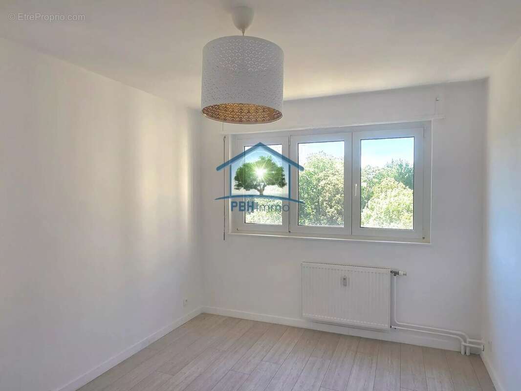 MULHOUSE (68) - Appartement de 75 m² avec garage et cave - photo 8