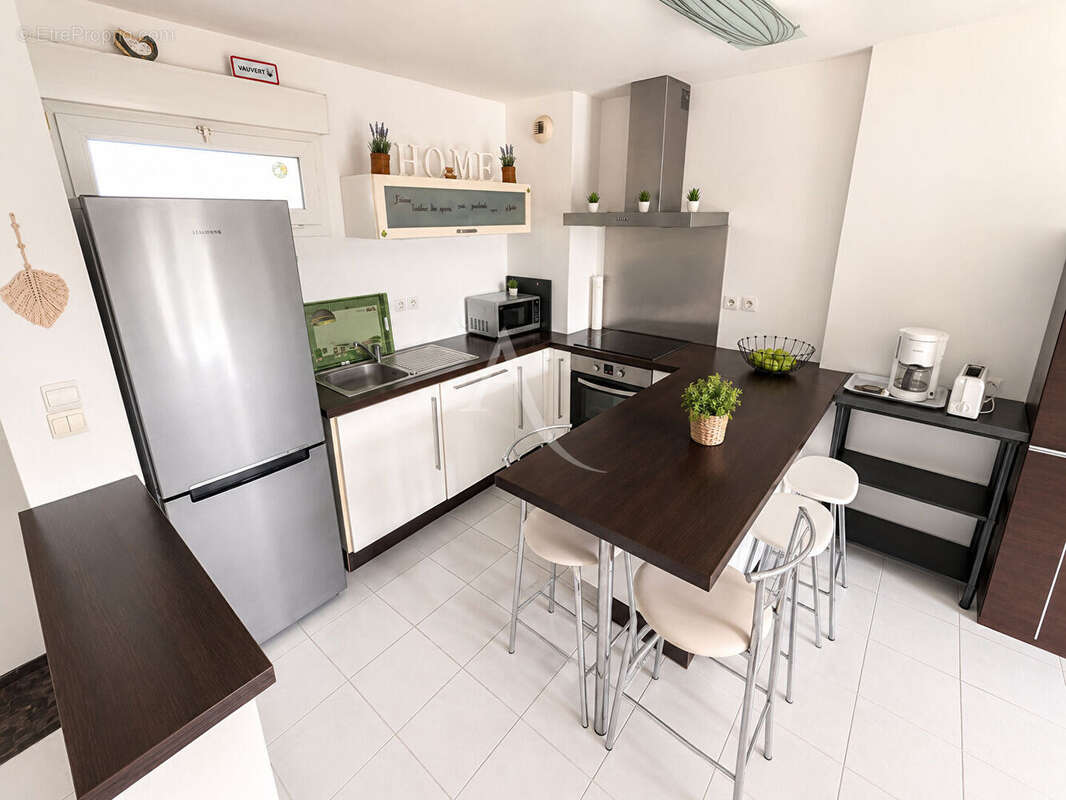 Appartement - Plain-pied - Vauvert - 3 pièces 63.51 m² avec jardin - photo 3