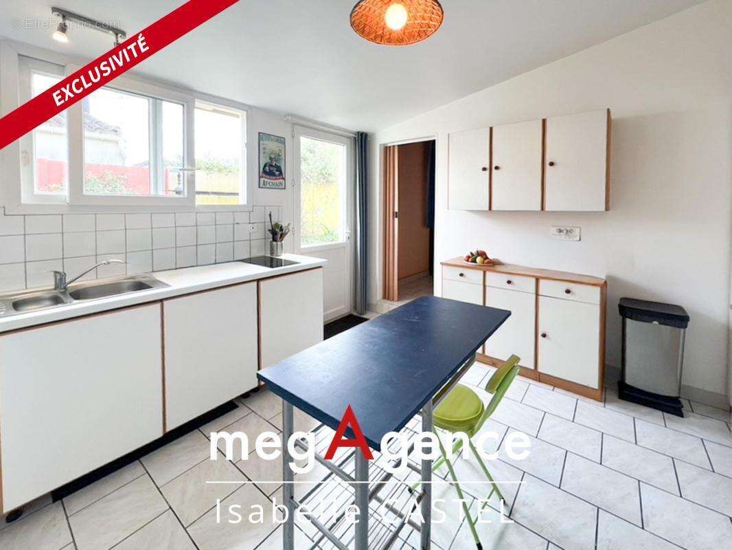 Maison de plain-pied avec dépendance proche gare et commerces - photo 4