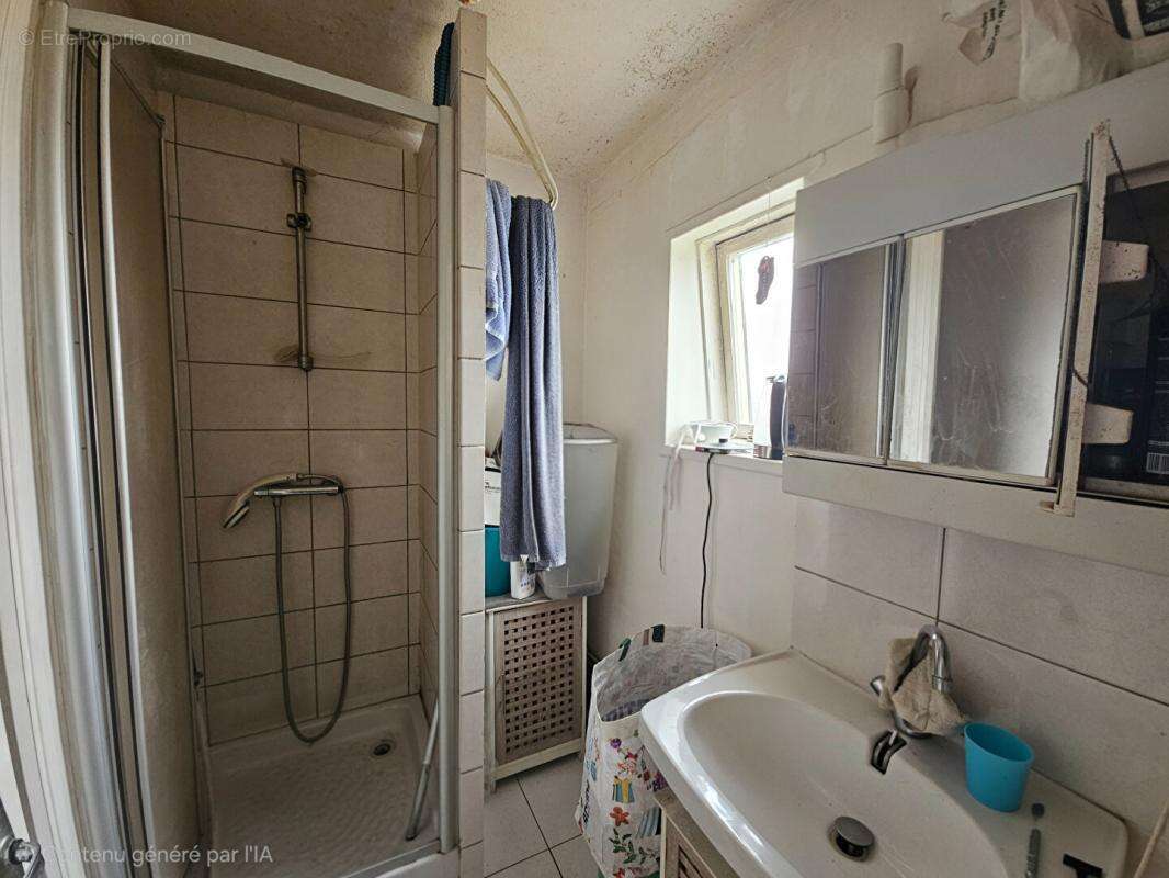 Appartement à DONVILLE-LES-BAINS