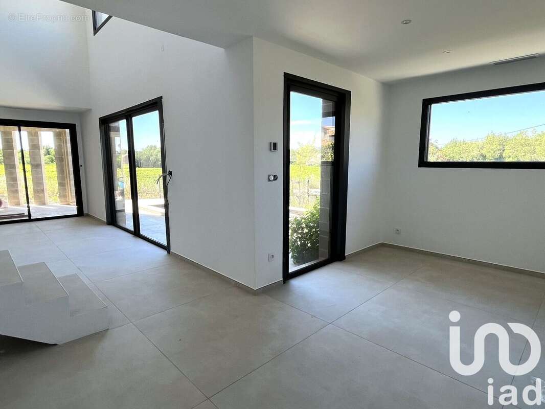 Photo 4 - Maison à LAUDUN-L&#039;ARDOISE