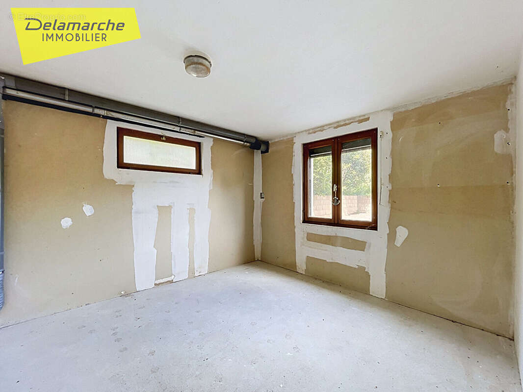 Maison de plain-pied - 2 chambres - Sous-sol complet - DUCEY-LES-CHERIS (50220) - photo 11
