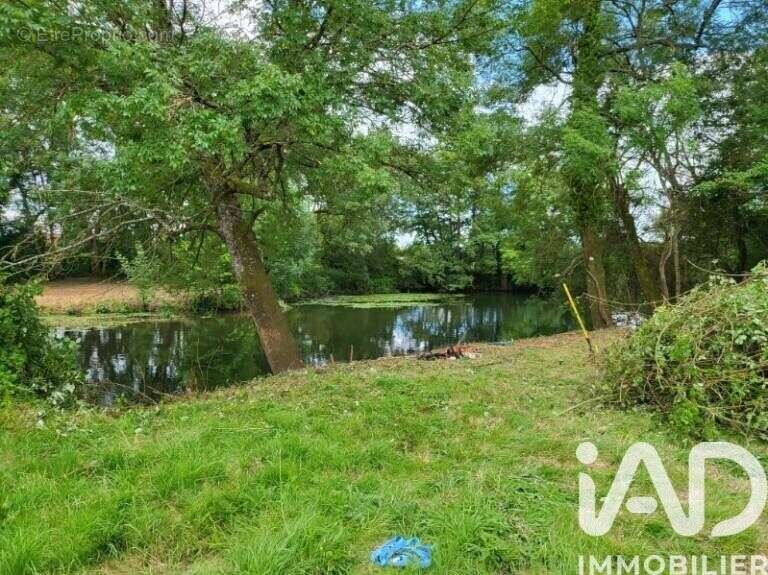 Photo 1 - Terrain à PEZOU