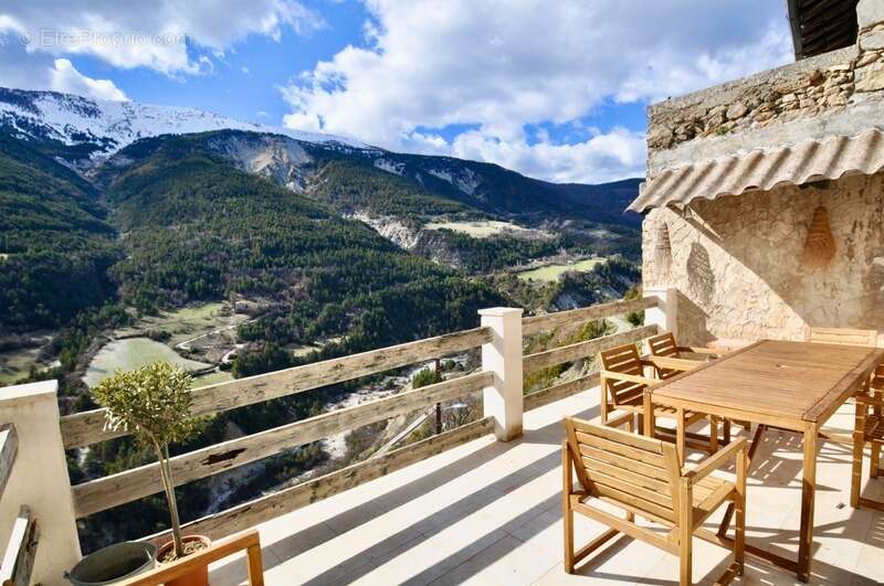 Dpt Alpes de Haute Provence (04), à vendre Proche Annot  Maison de charme en pierres 6 pièces 110 m² Terrasse, Vue - photo 4