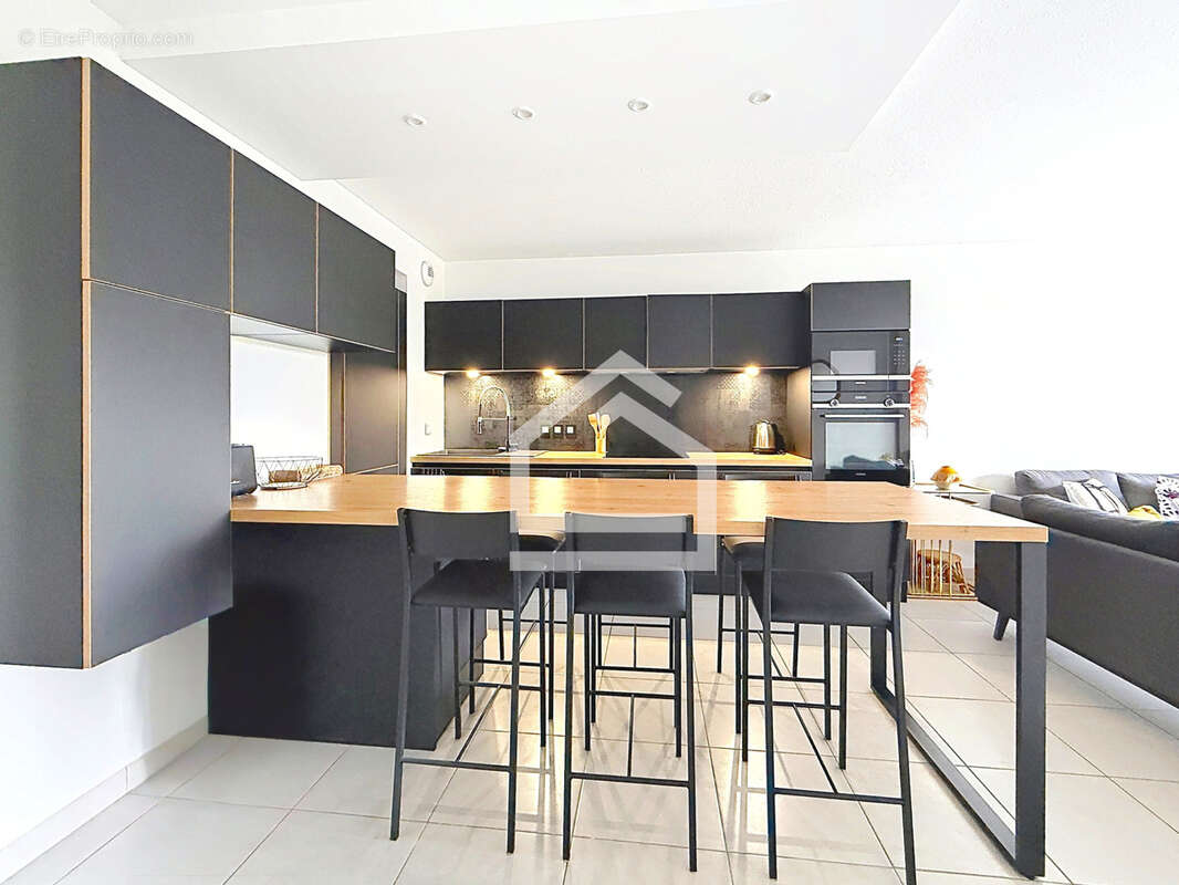 Appartement contemporain 4 pièces avec balcon au sein d'une résidence récente - photo 4
