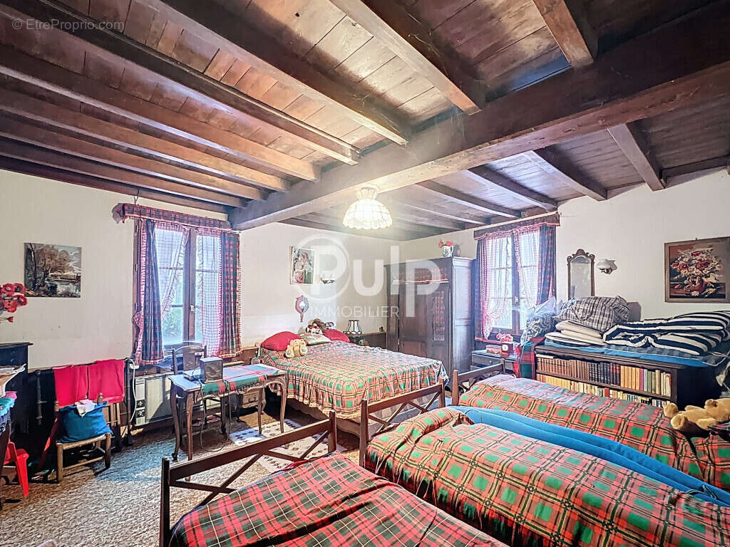 Maison à AUBROMETZ