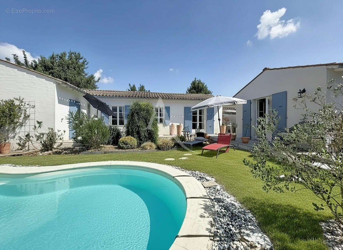Villa de style rhétais 7 pièces - piscine chauffée - photo 10