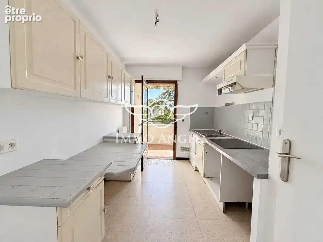 Appartement 4 pièces 82 m² à vendre à Nimes (30900) - photo 5