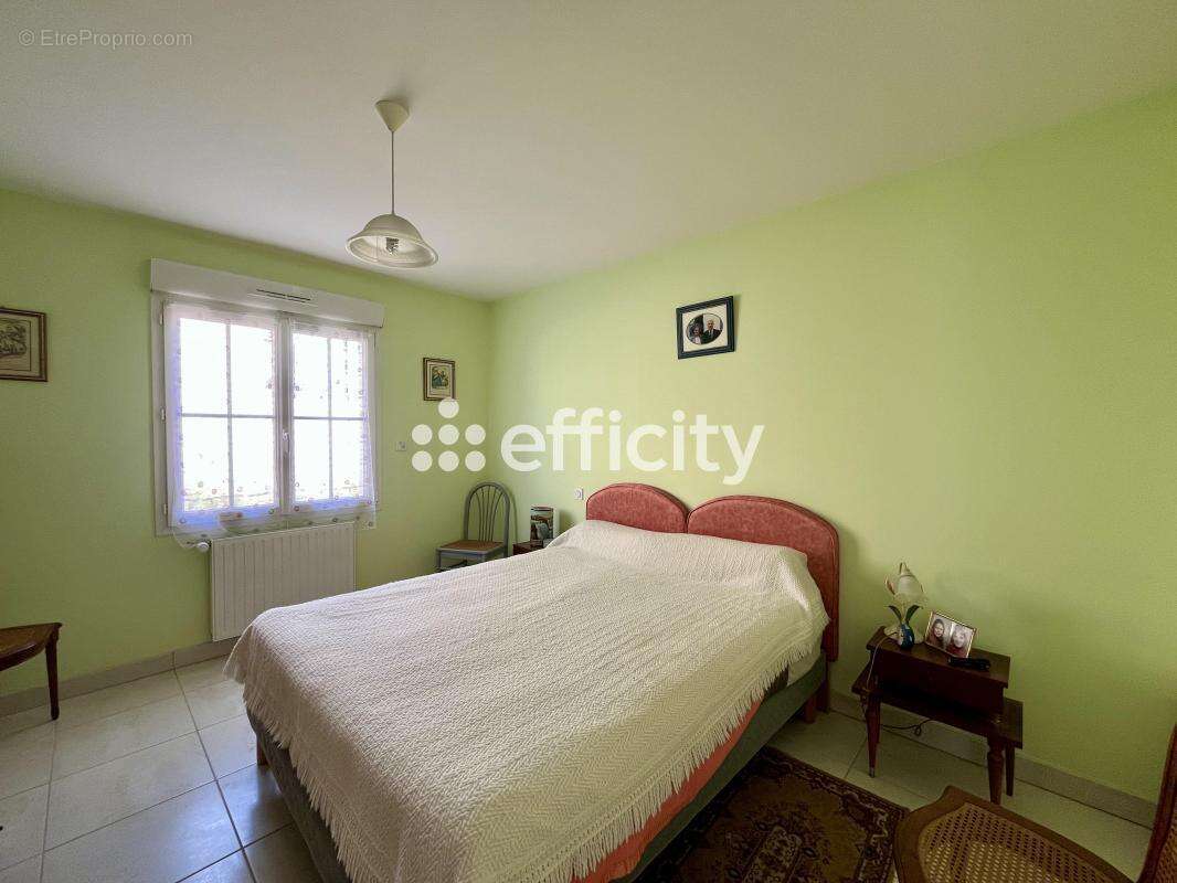 Maison 80 m² à Buxerolles  - photo 8