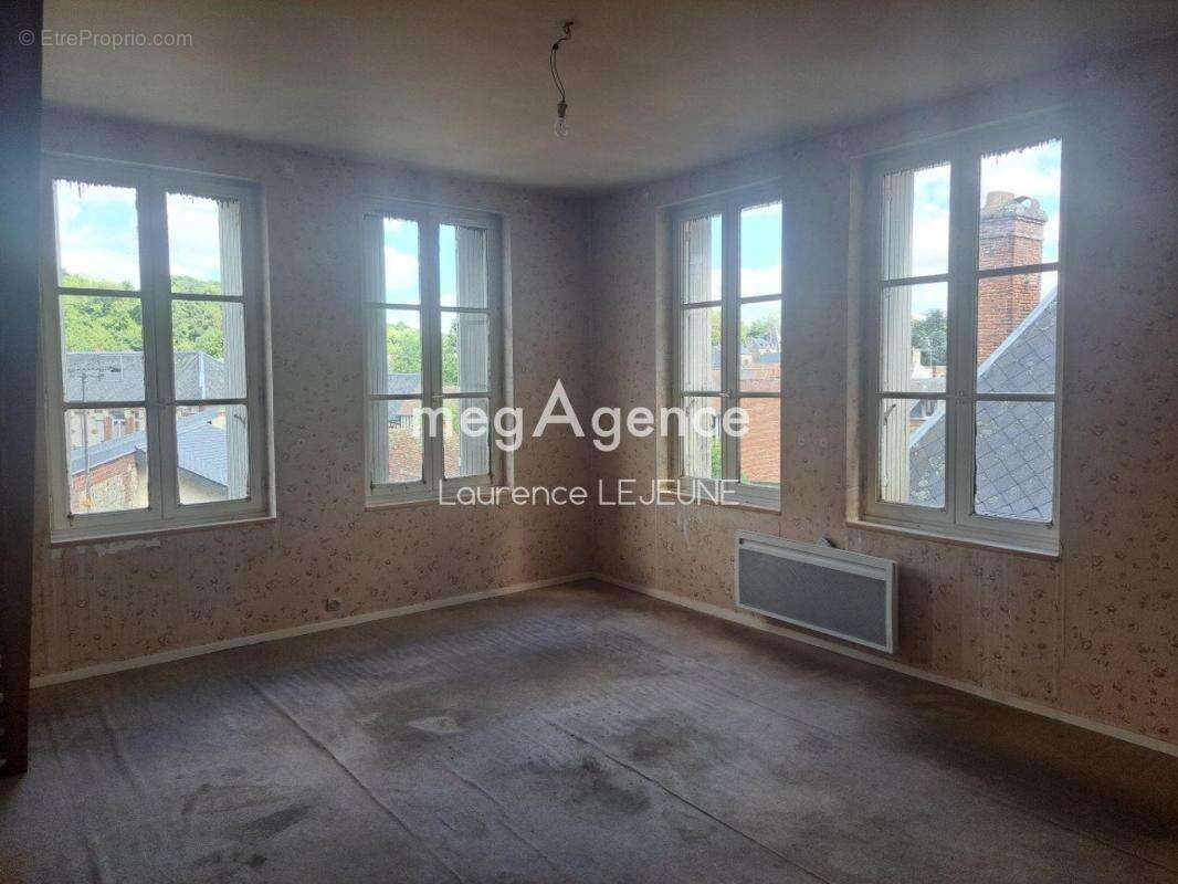 à ORBEC IMMEUBLE en monopropriété 7 appartements 1 boutique 1 local - photo 14