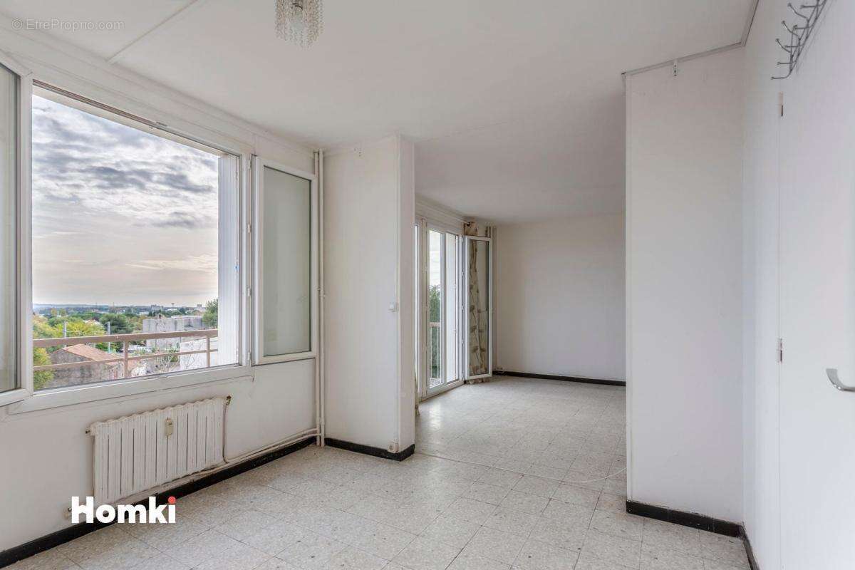 Appartement 3 pièces de 69m2 avec parking et vue à Nîmes Jean-Jaurès - photo 8